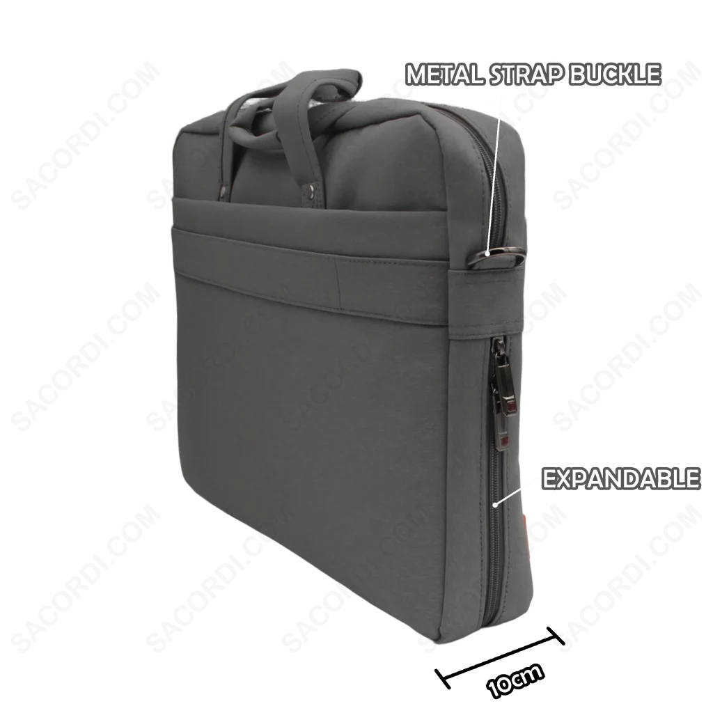 Grey shoulder bag featuring a metal strap buckle and expandable properties. Measures 10 centimeters in width.